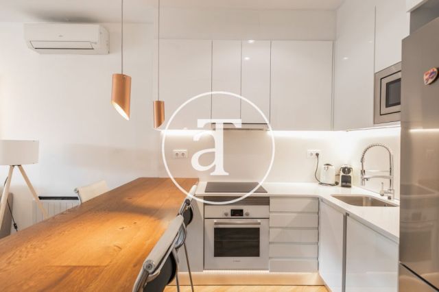 Location temporaire d'un penthouse avec 2 chambres et 2 salles de bain, meublé et proche du parc Turó. 16