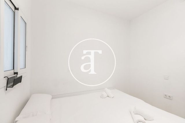 Location temporaire d'un penthouse avec 2 chambres et 2 salles de bain, meublé et proche du parc Turó. 29