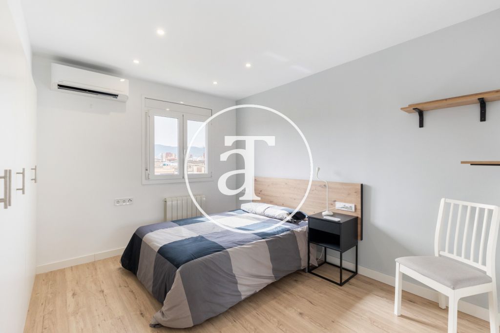Appartement en location temporaire avec 2 chambres, bureau, 1 salle de bain et balcon à Sant Andreu 13