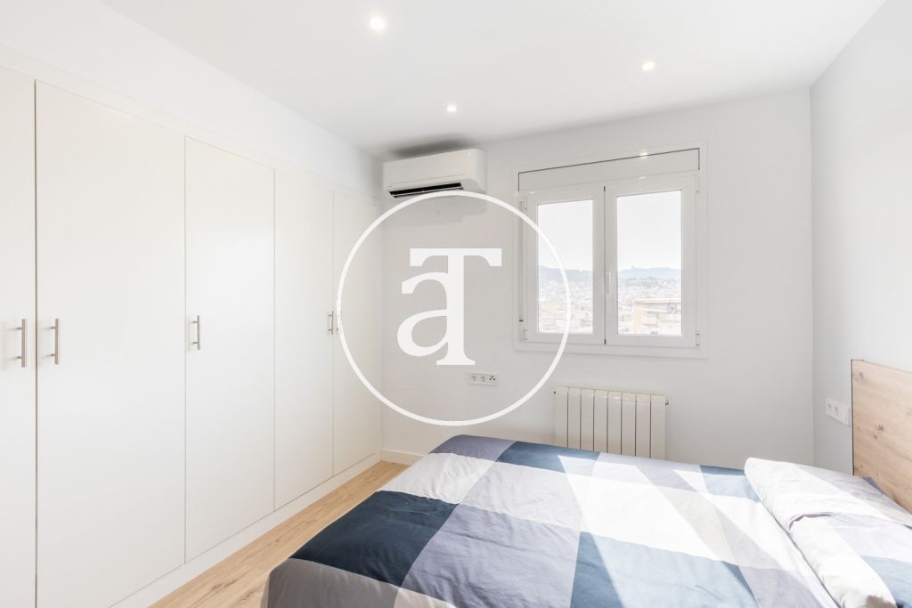 Appartement en location temporaire avec 2 chambres, bureau, 1 salle de bain et balcon à Sant Andreu 15