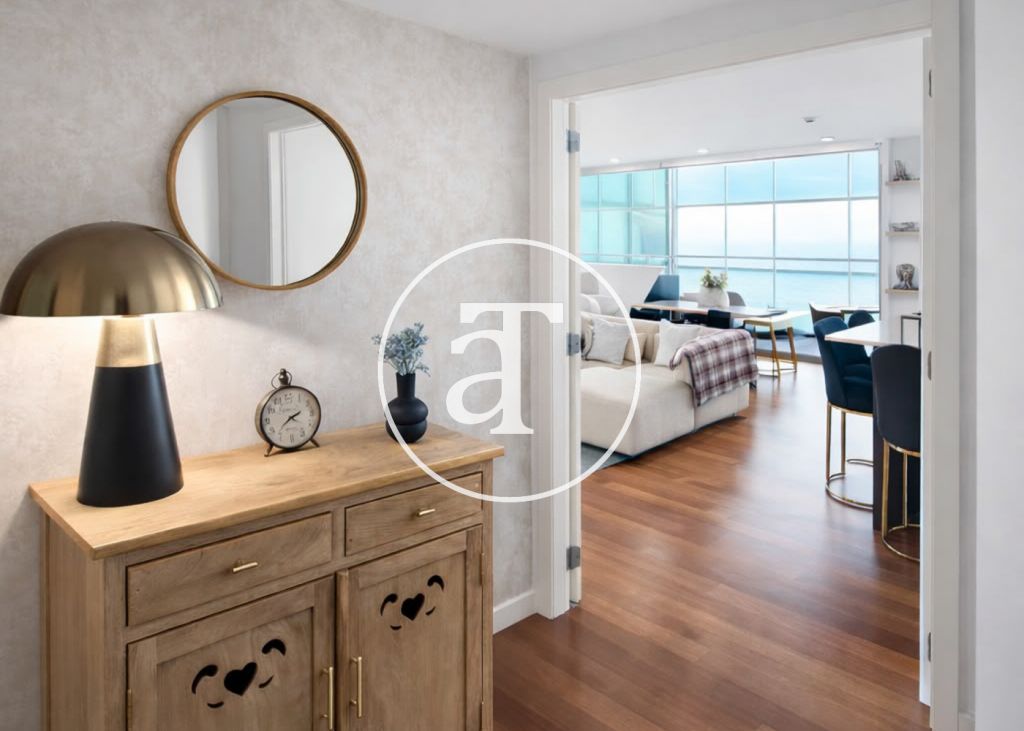 Monthly rental apartment with 3 bedrooms and 2 bathrooms, terrace with gym equipment and sea views in Sant Martí 13
