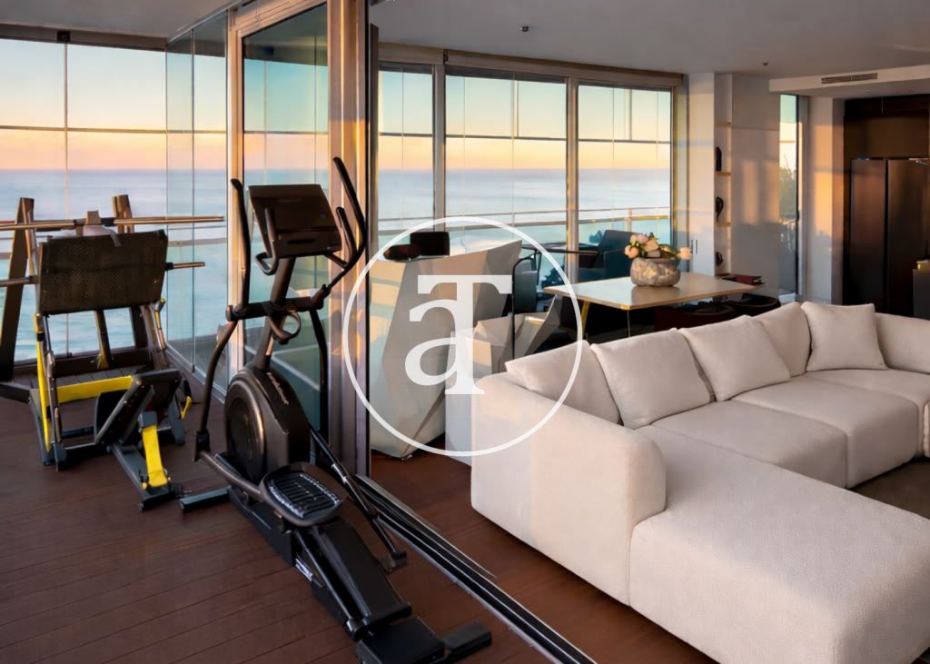 Monthly rental apartment with 3 bedrooms and 2 bathrooms, terrace with gym equipment and sea views in Sant Martí 11