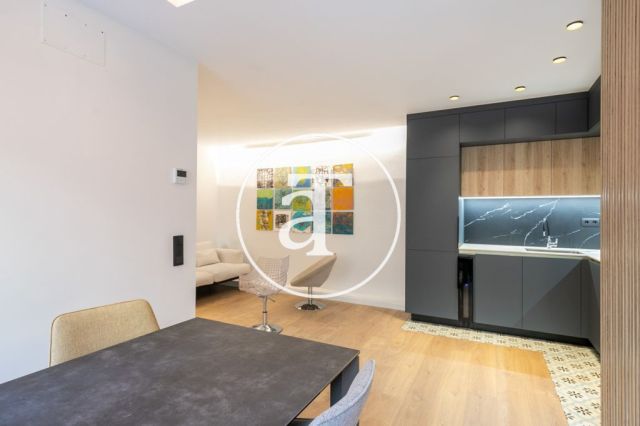 Monthly rental design apartment with 2 bedrooms and terrace steps from Passeig Sant Joan and Arc de Triomf 12