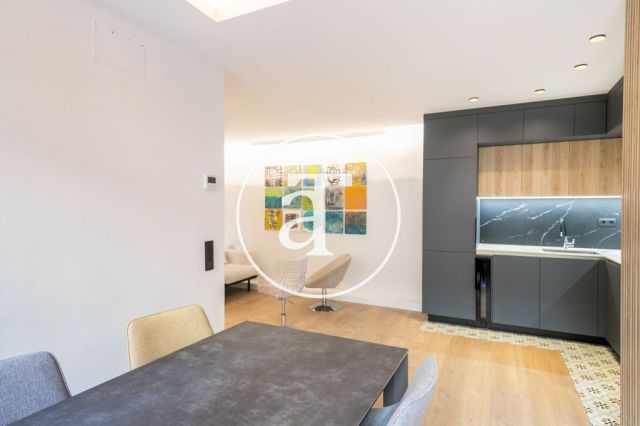 Monthly rental design apartment with 2 bedrooms and terrace steps from Passeig Sant Joan and Arc de Triomf 13