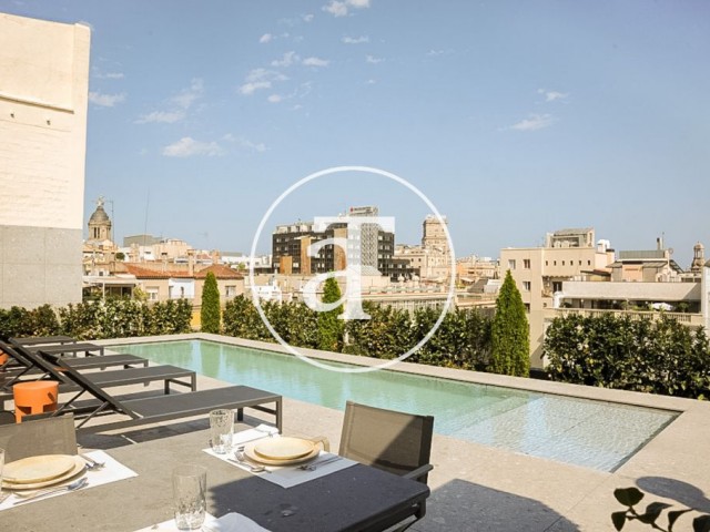 Monthly rental of brand new apartment with 2 bedrooms and terrace steps from Paseo de Gracia